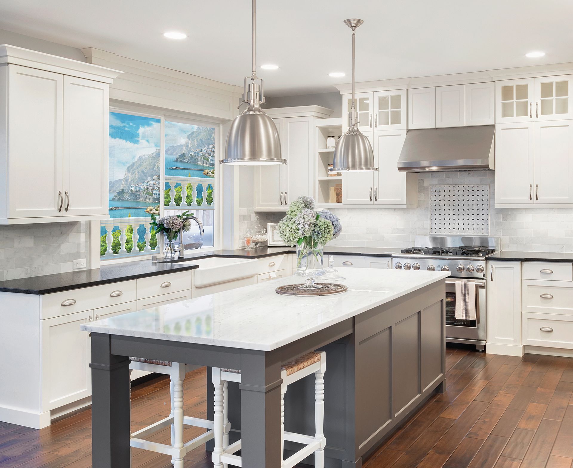 There is a large island in the middle of the kitchen.