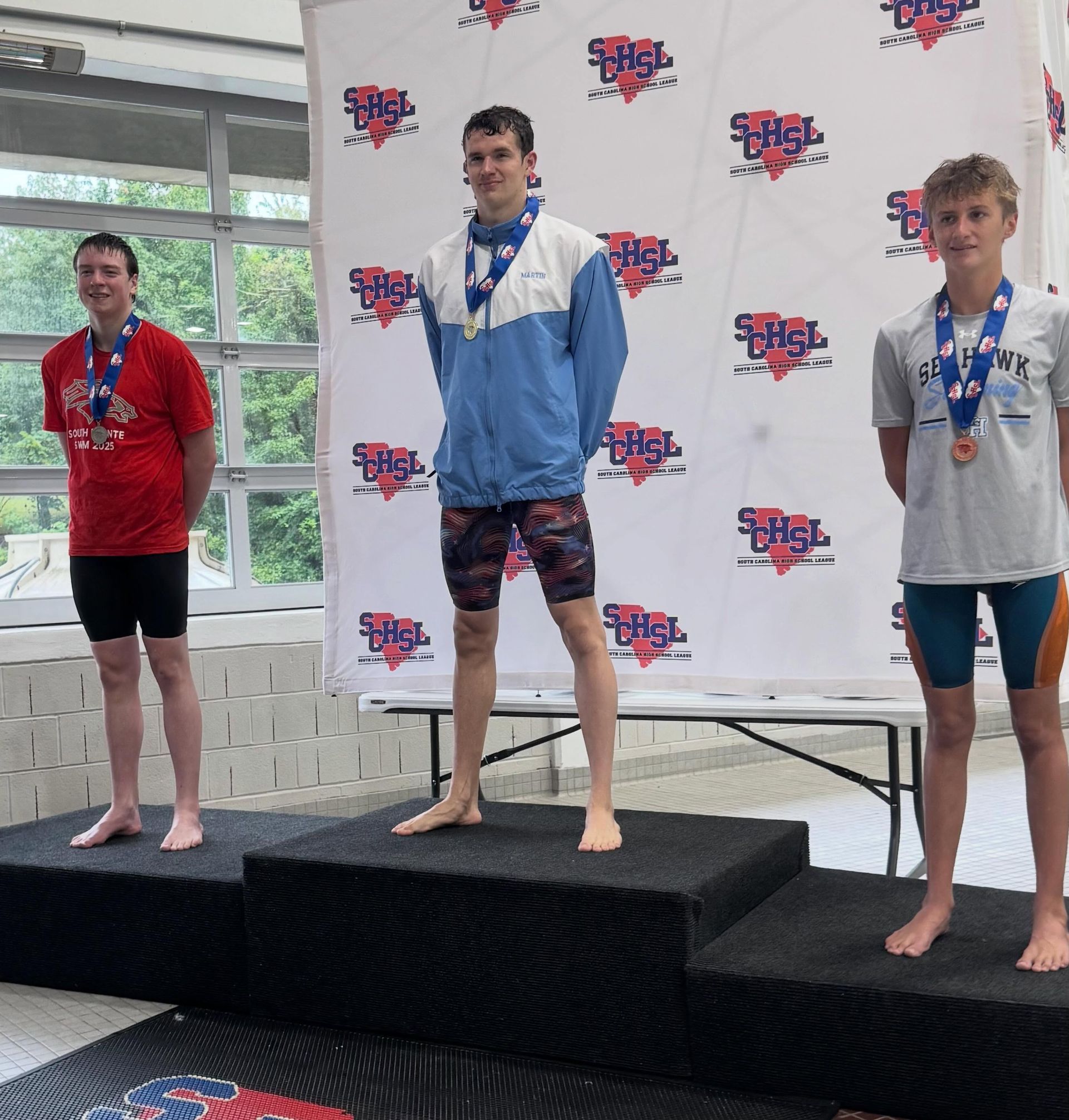 Grant Martin gets 1st in 200 individual medley and 100 breaststroke. Source: Instagram @lwchargerswimming