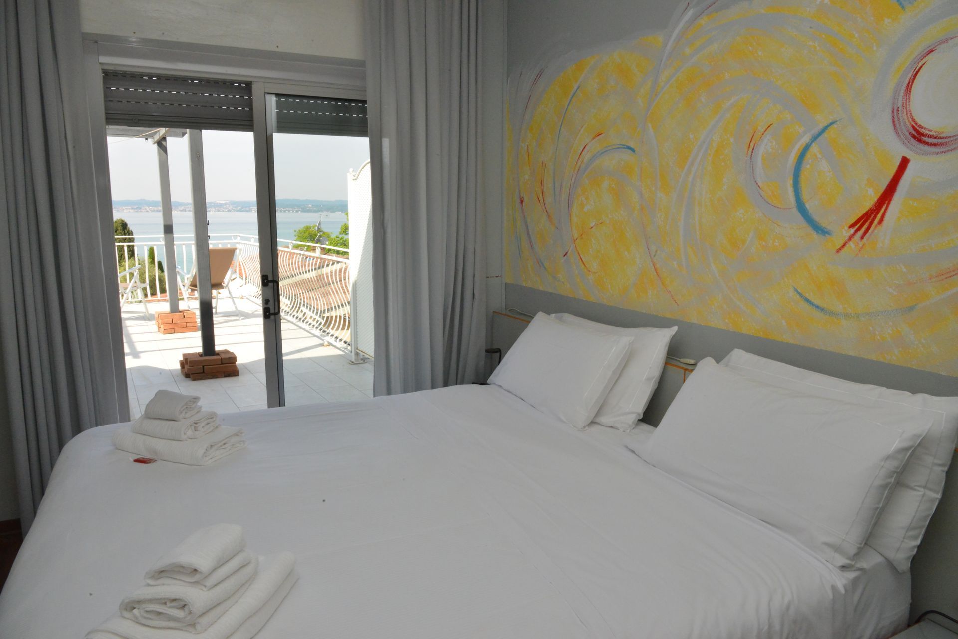Camera Doppia superior con solarium vista lago di Garda a Sirmione