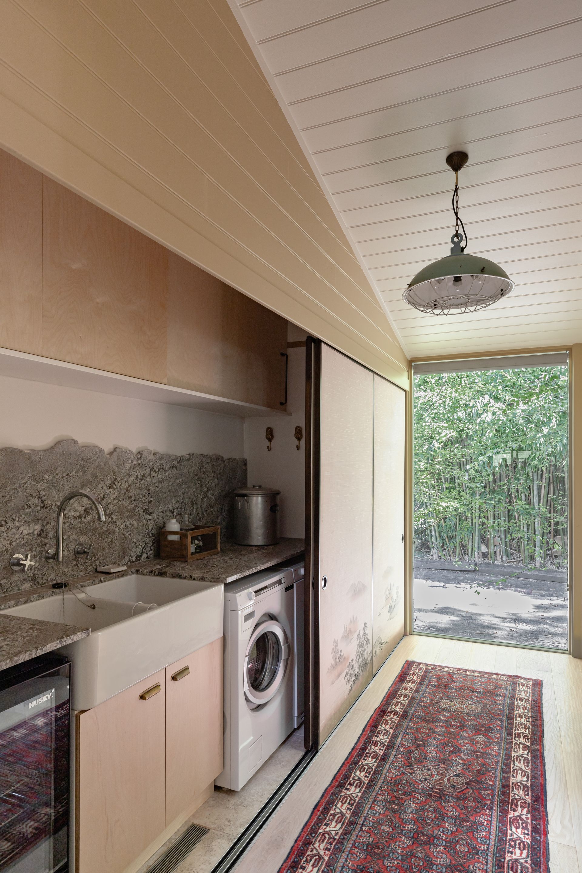 Laundry With Sliding Door and Cabinets— BSpoke Cabinet Making & Joinery in Unanderra, NSW