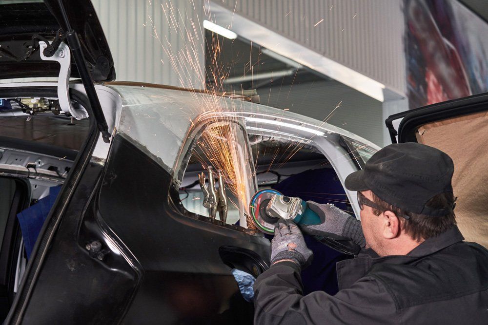 Working with Angle Grinder — Hobart, TAS — Hobart Smash Repairs