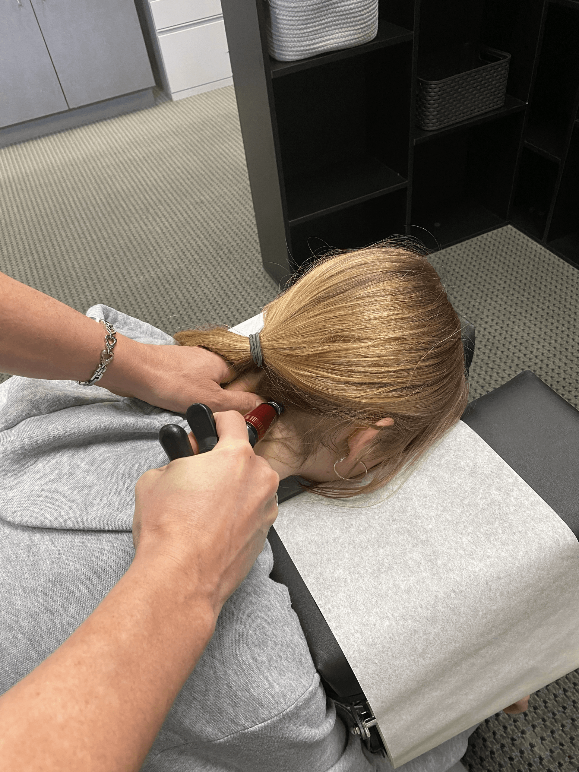 Chiropractic Neck Adjustment — Brighton, MI — Dr. Maria Lyons The Den Chiropractic