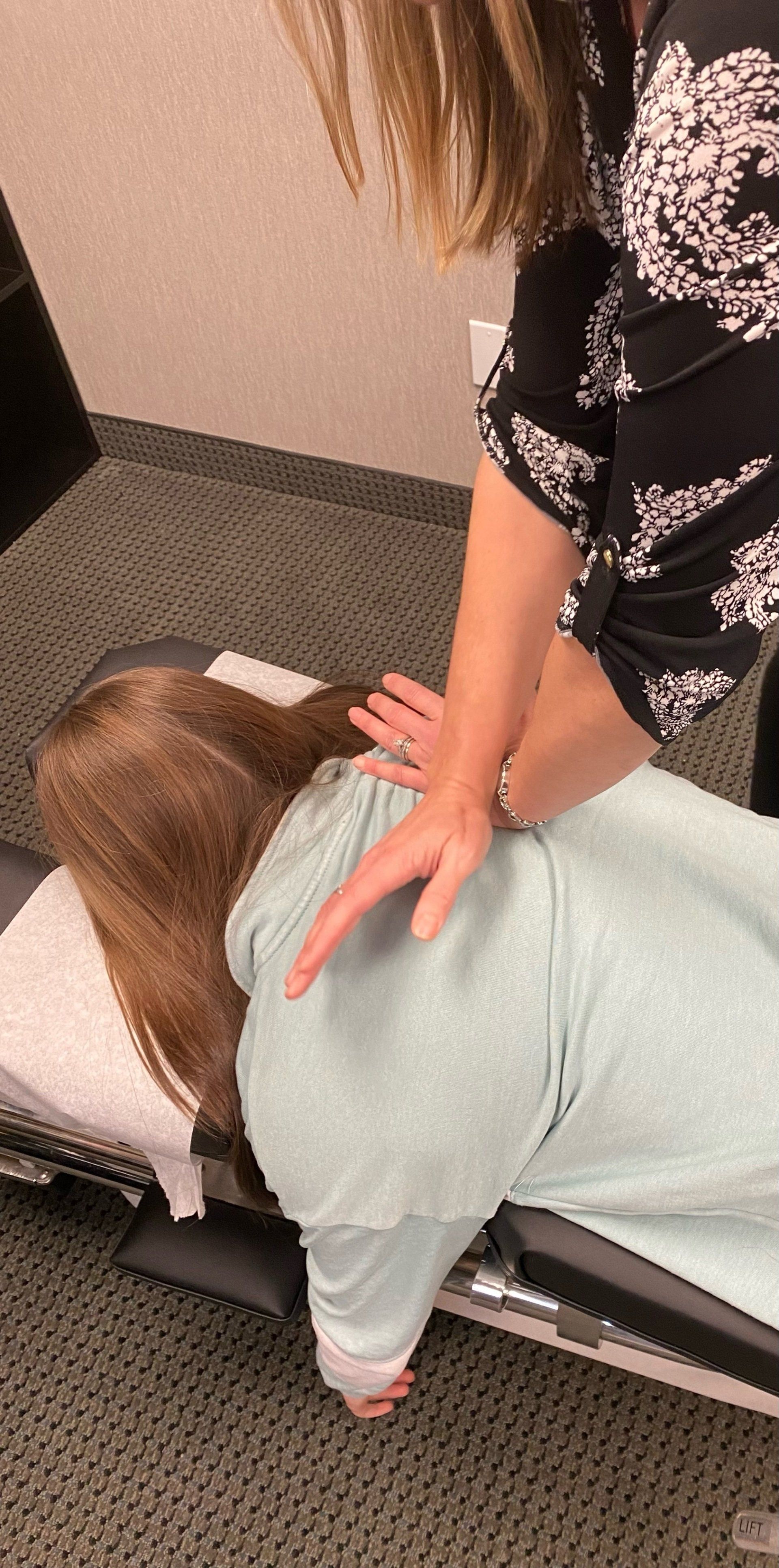 Topless Patient — Brighton, MI — Dr. Maria Lyons The Den Chiropractic