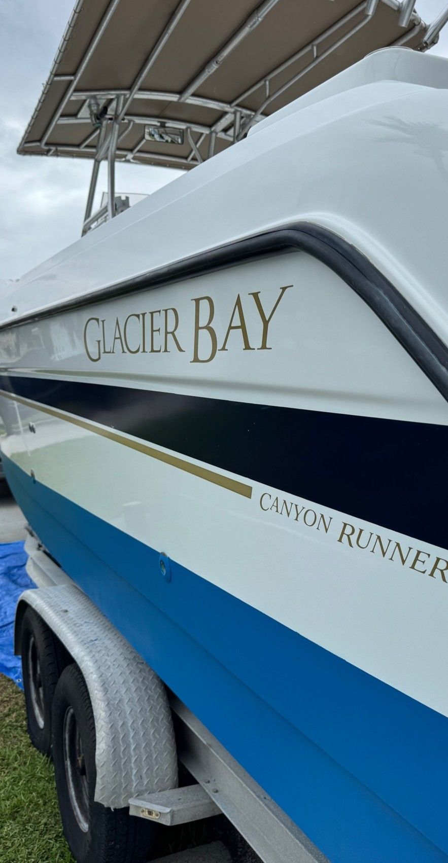 White and blue boat with 
