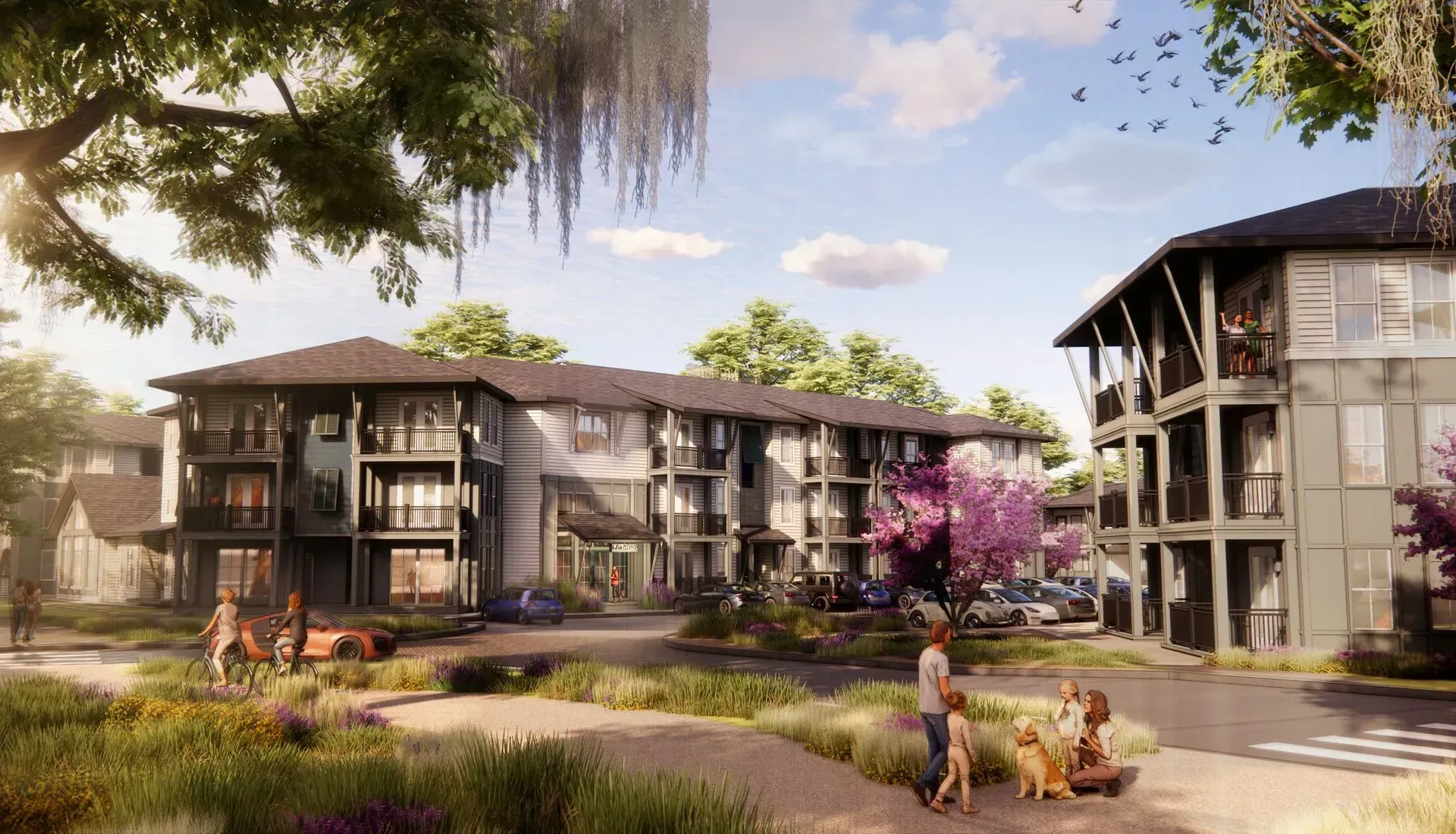 Modern apartment complex with balconies, trees, and people relaxing in a sunny courtyard