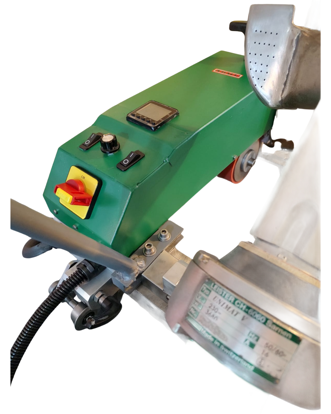 Green and silver welding machine with power switch and control panel.