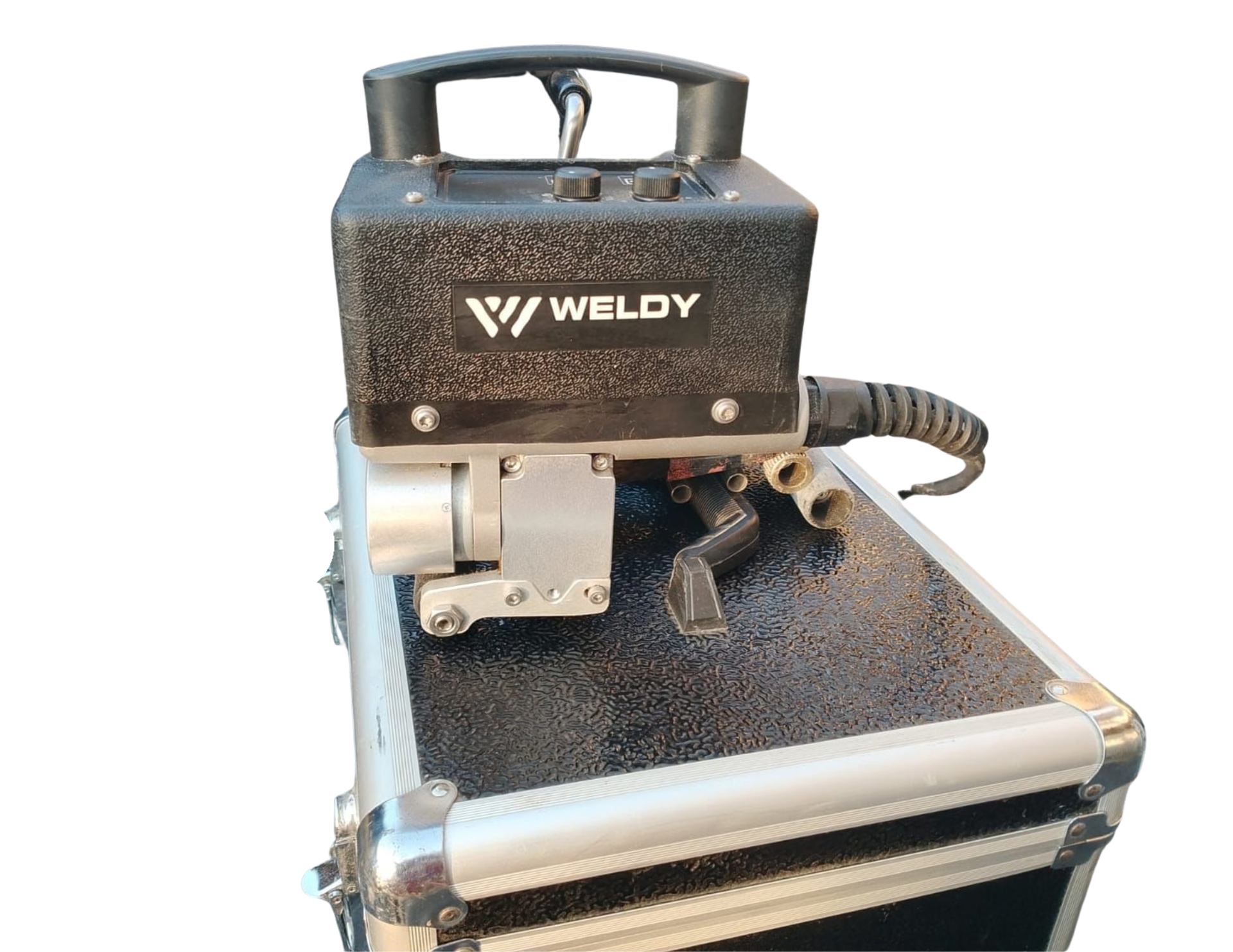 Black and silver Weldy hot air welding tool on a silver suitcase with a black textured finish.