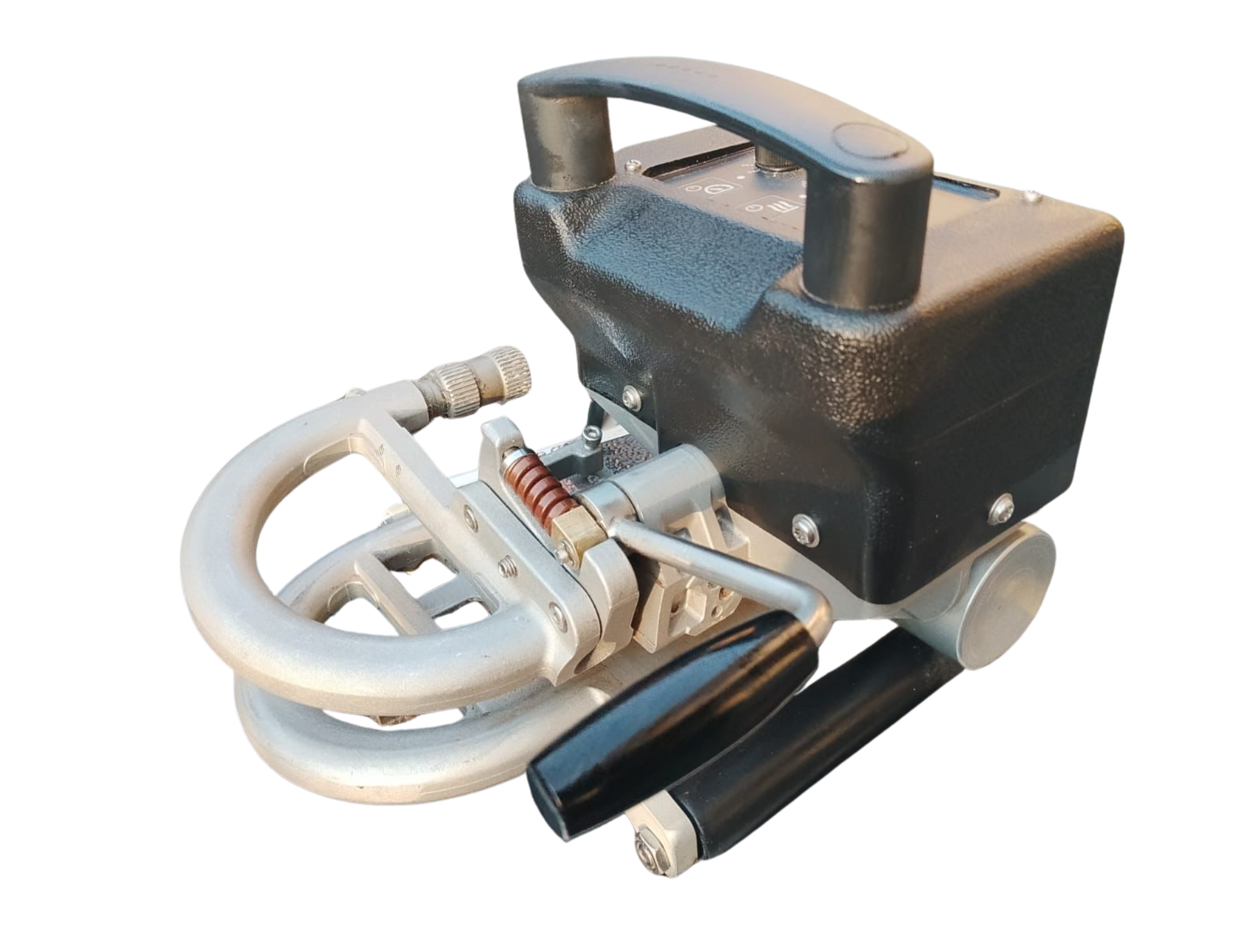 Black and silver hand-operated machine with a handle, coiled tubing, and a carrying handle.