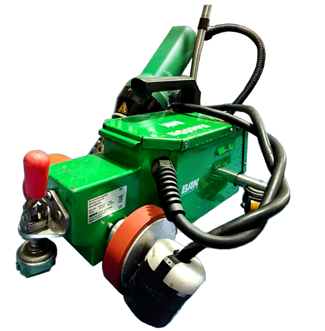 Green plastic welding machine with black and red accents, used for industrial applications.