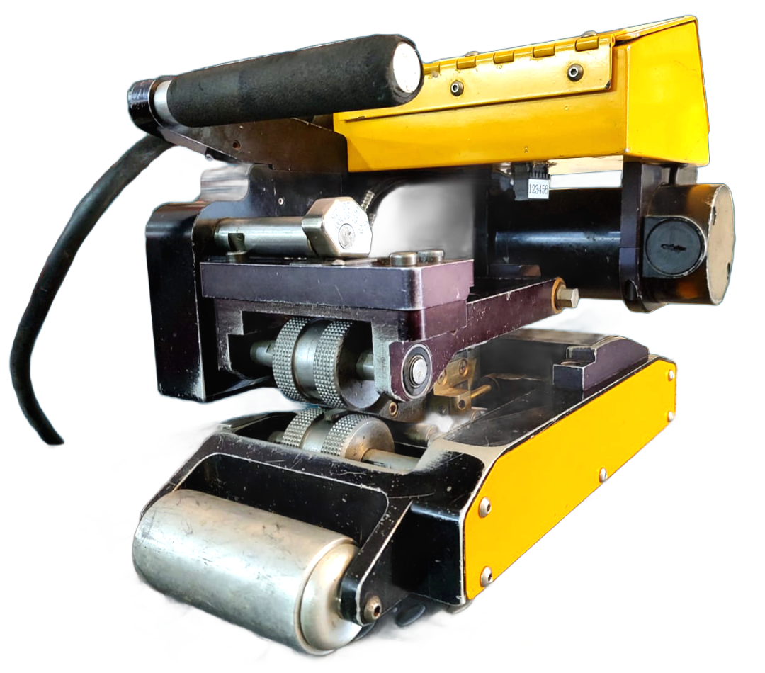 Yellow and black industrial machine with handle and roller, likely for a specific task.