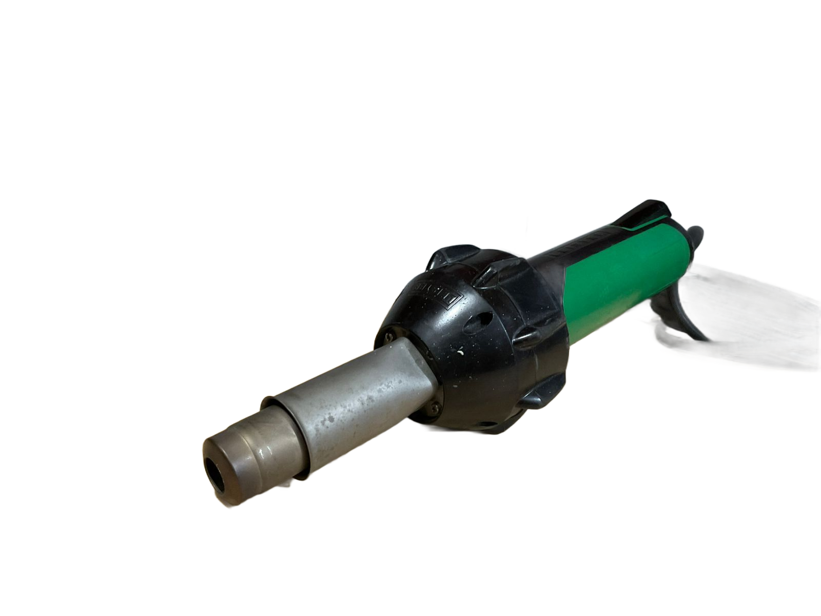 Green and black power tool with a nozzle extending to the left.