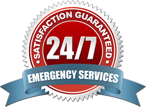 A badge that says 24/7 emergency services on it