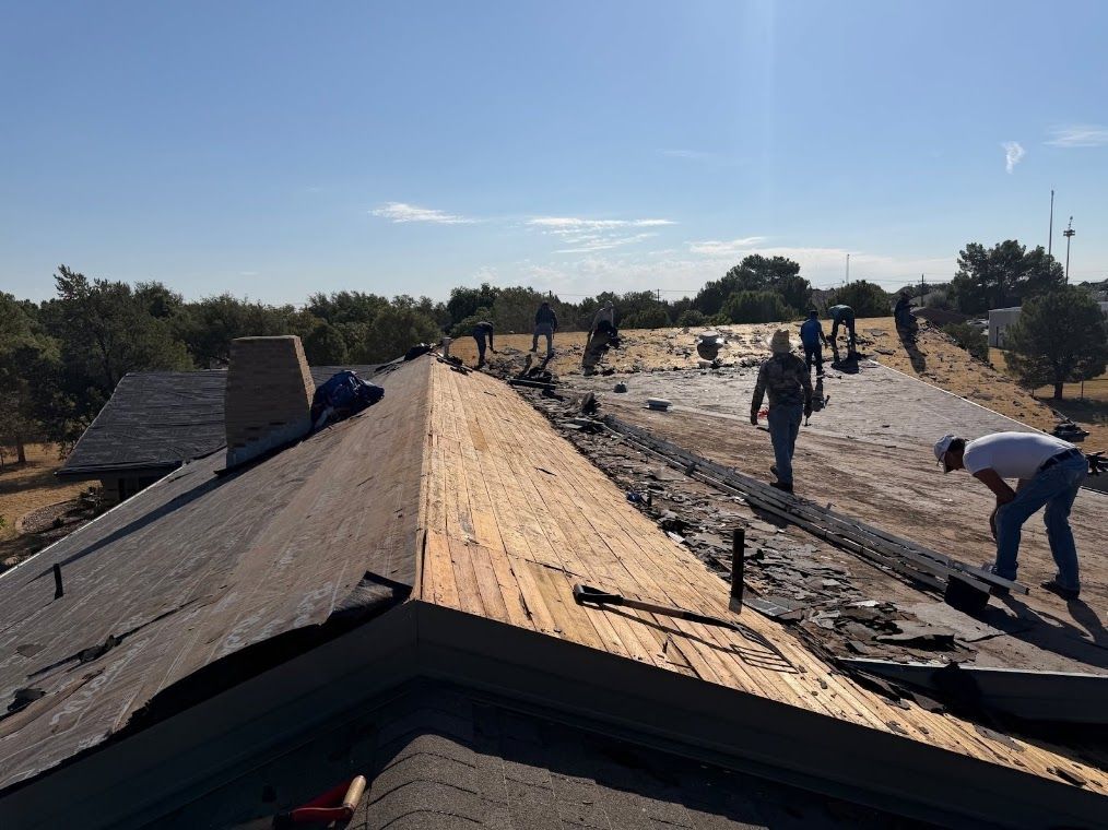 Roofs by Nicholas crew installing shingles on a West Texas roof