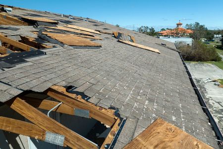 Grey asphalt shingle roof installation on residential home by Roofs by Nicholas in Texas