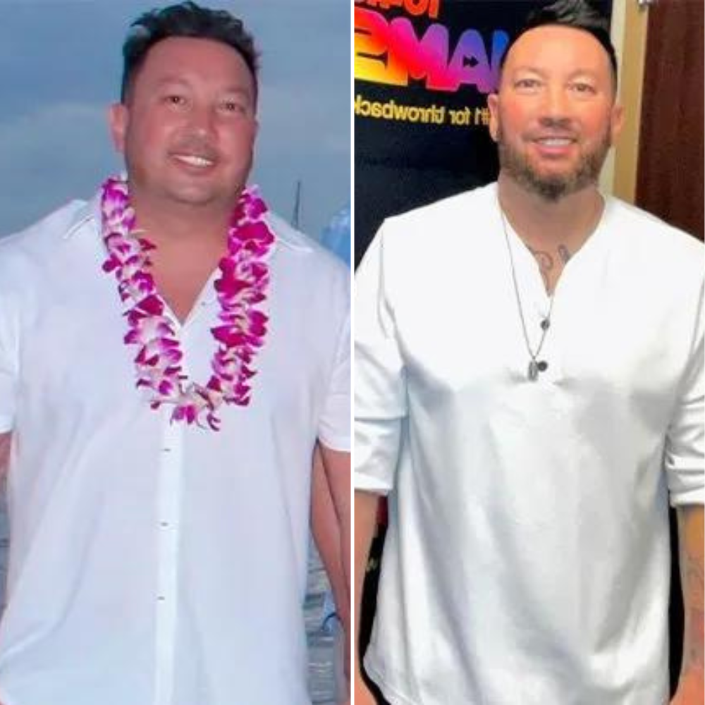 Two men posing. One wearing a flower lei and one with a goatee in a studio setting.