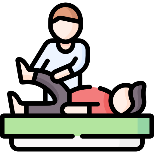 Physiotherapist stretching a patient's leg on a green table.