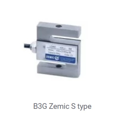 Célula de carga tipo B3G Zemic S, un sensor en forma de S de color plateado con etiqueta.