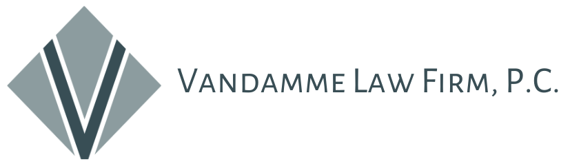 A logo for vandamme law firm p.c.