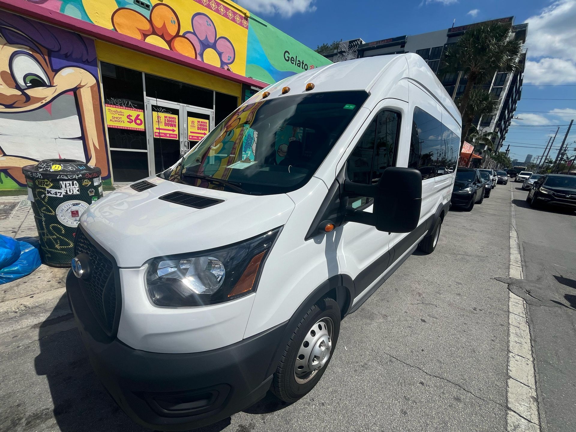 White Miami tour Bus parked in Whynwood Walls 