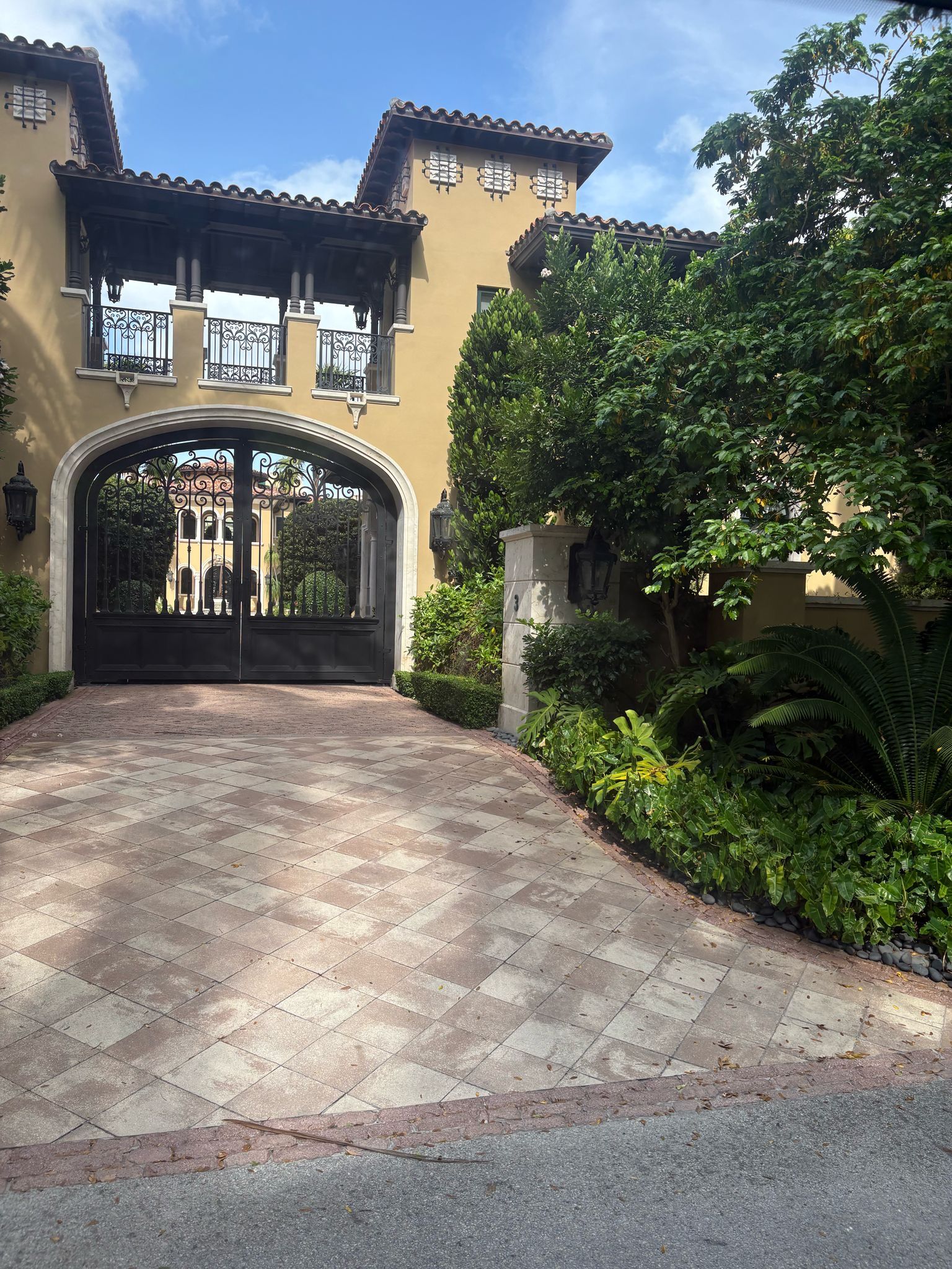 Luxury Mediterranean mansion viewed during a Miami Tour Bus sightseeing experience on Star Island
