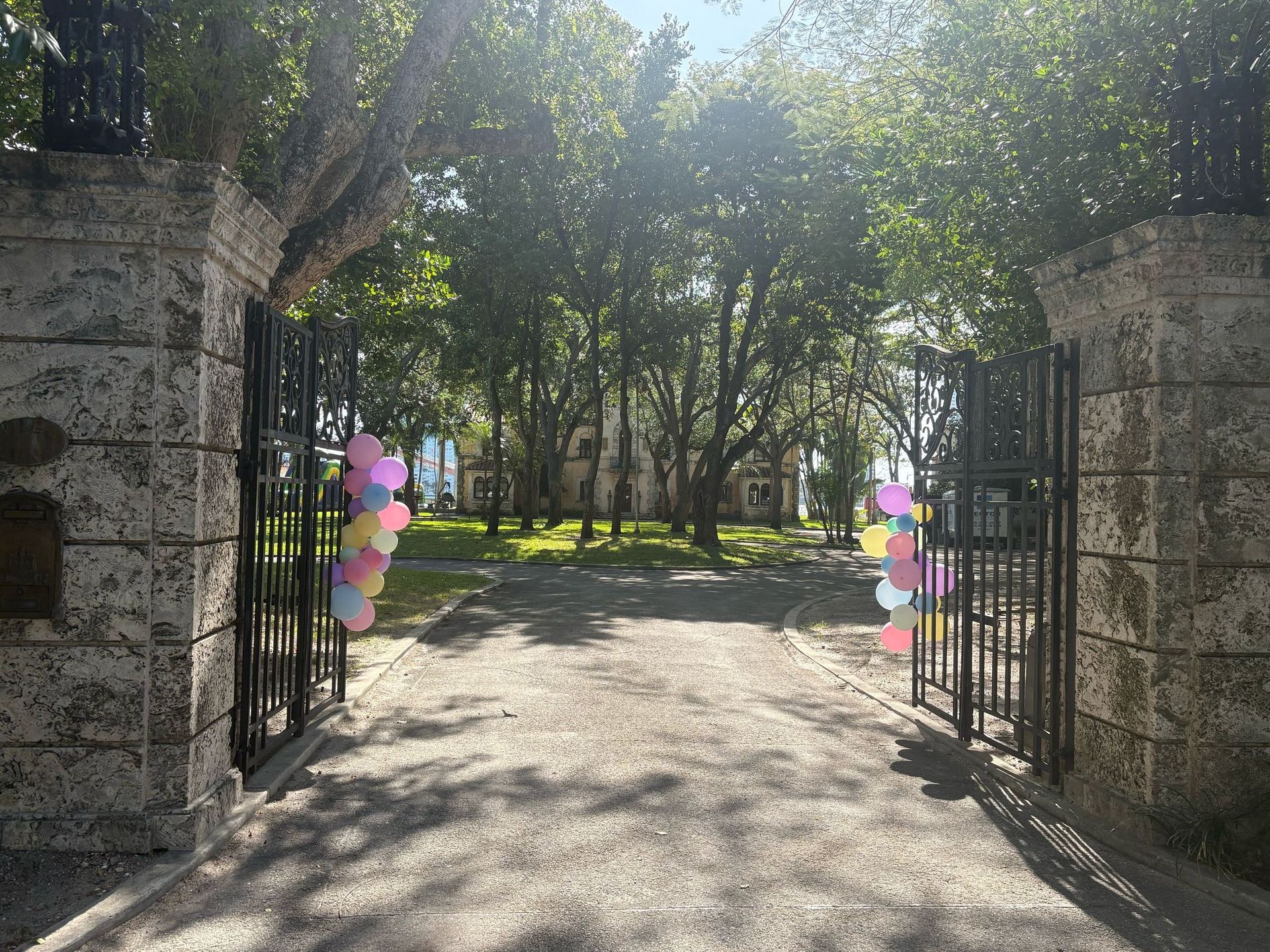 Private mansion entrance on Star Island decorated for an event, seen during the Miami Tour Bus sightseeing experience
