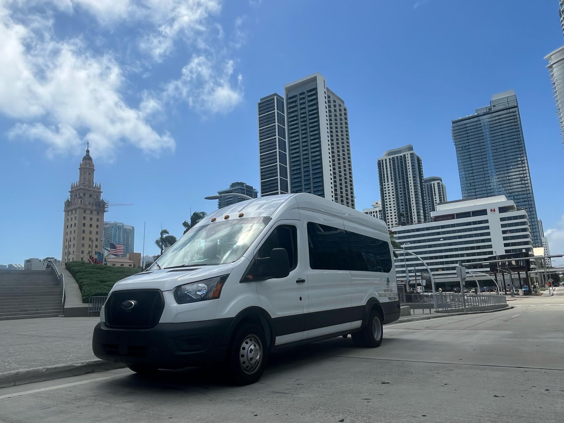 “Tour bus parked at Bayside ready for city adventure”
