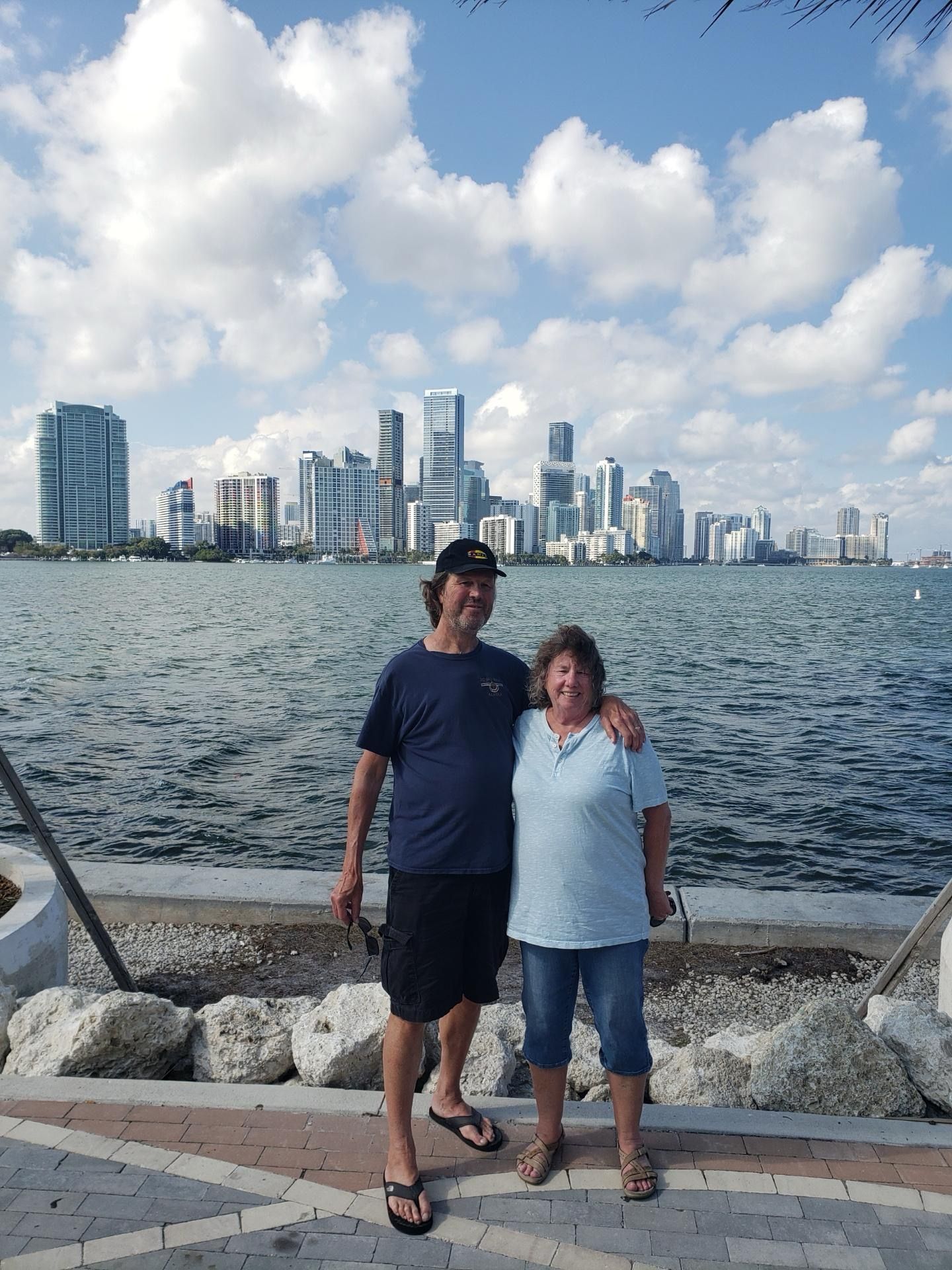 Couple enjoying secret Miami skyline photo stop during small group sightseeing tour
