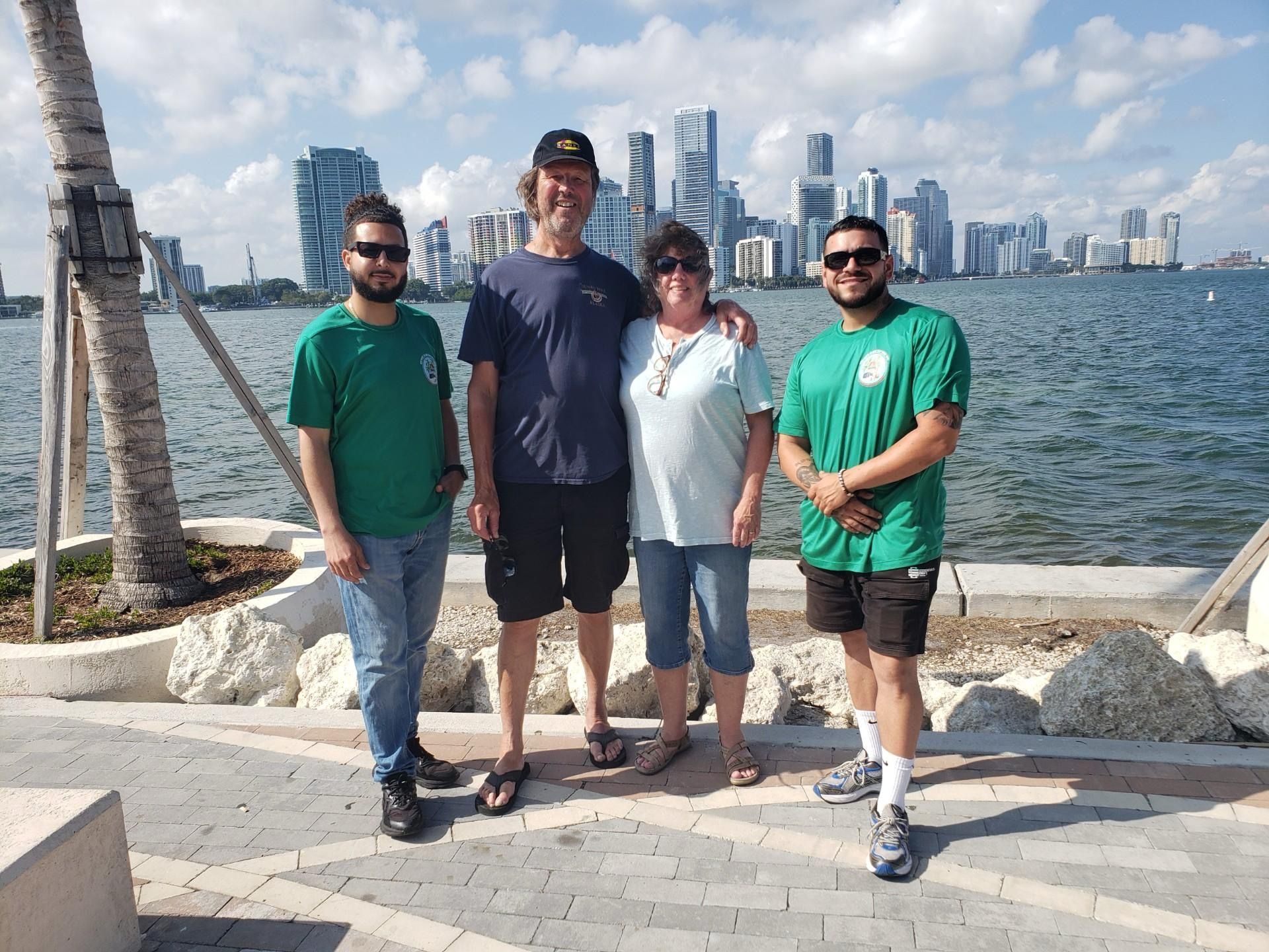 Guests and guides at secret Miami skyline photo stop during small group sightseeing tour
