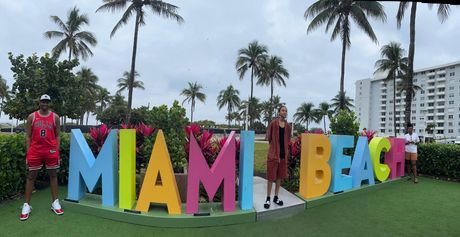 Passengers in the Miami Beach photo sign, taking selfies on the Miami Bus tour