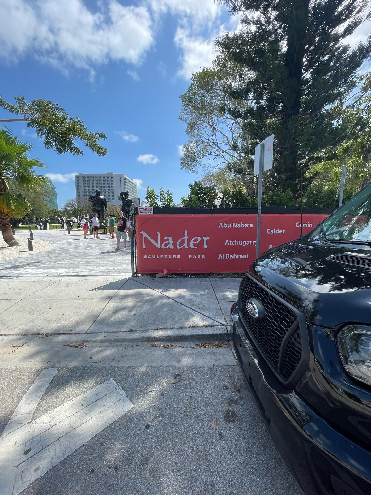 Miami tour bus parked by Nader Sculpture Park art stop
