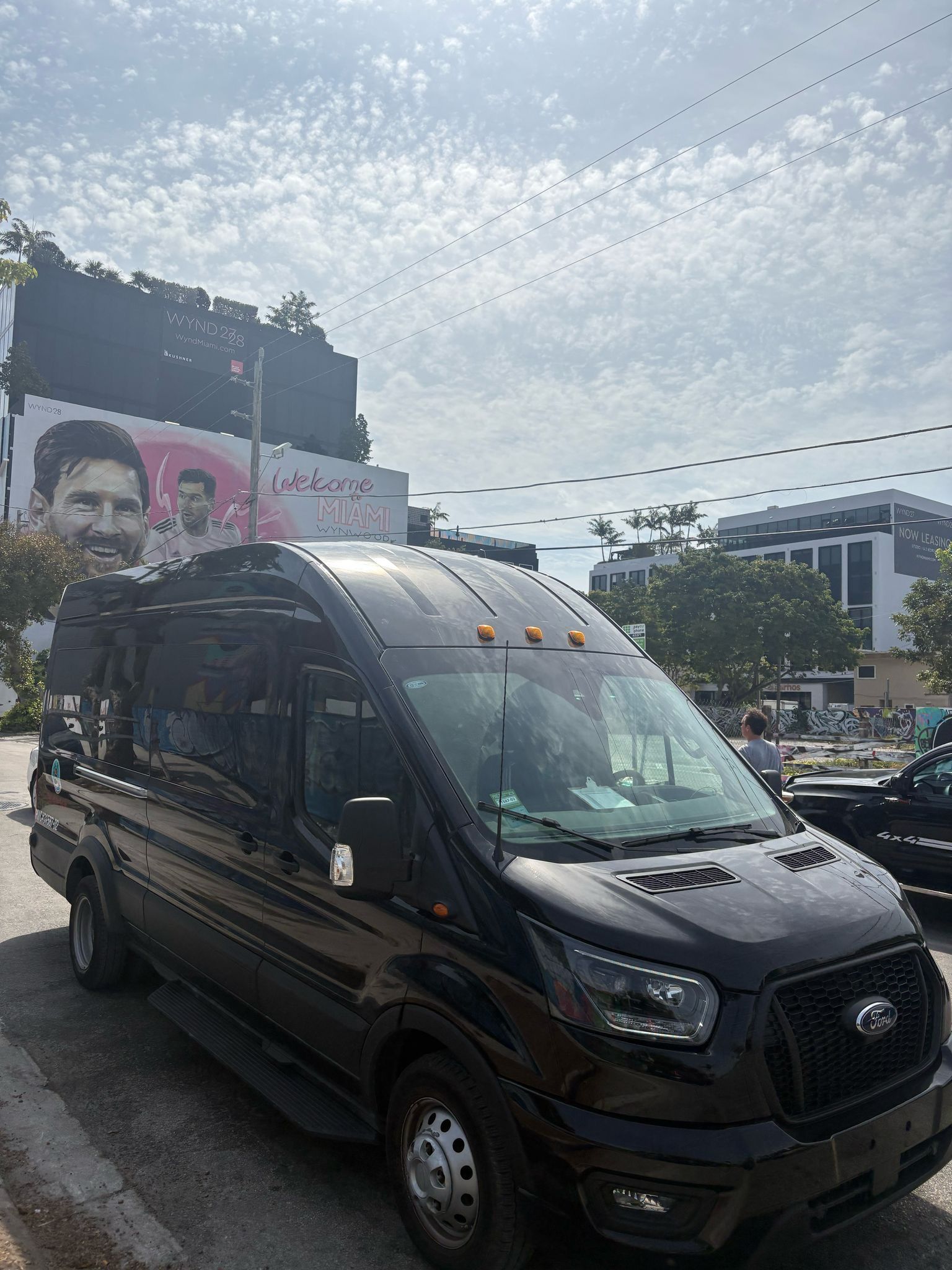 Miami city tour bus parked in Miami Wynwood Walls 