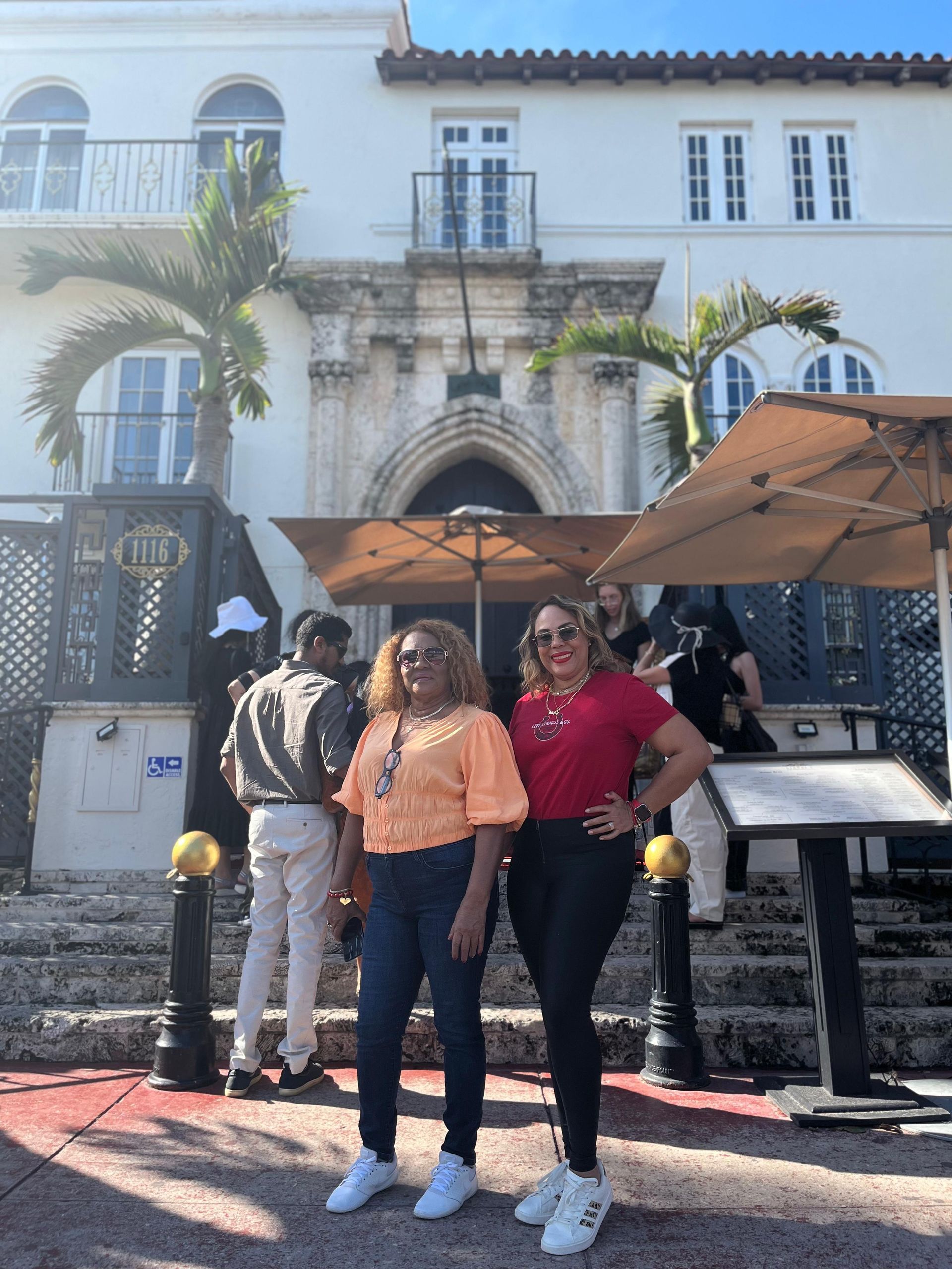 passengers-smiling-in-front-of-versace-mansion.jpg
