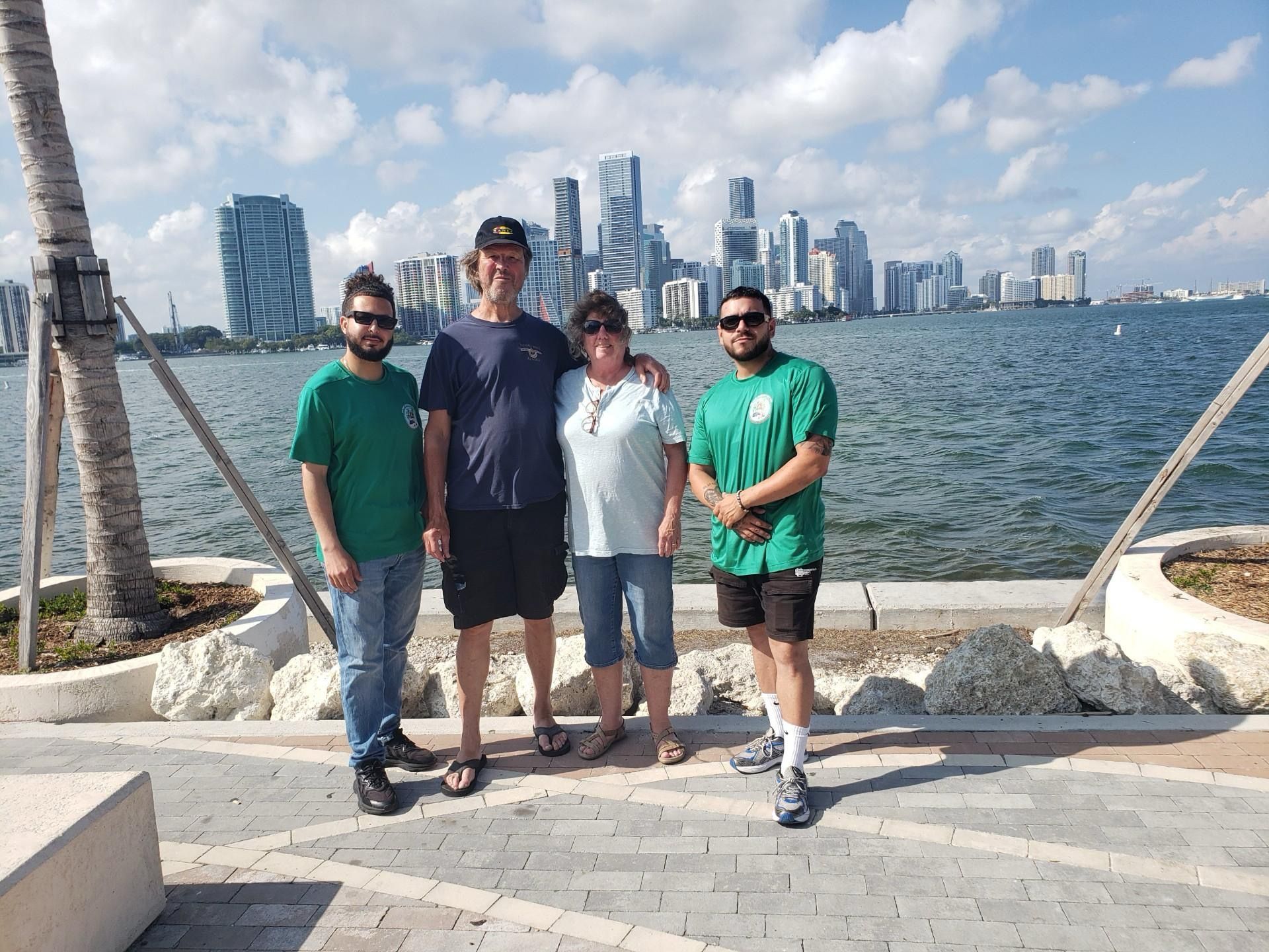 Miami city tour bus tour guide selfie, with passengers in the Miami Skyline secret photo spot. 