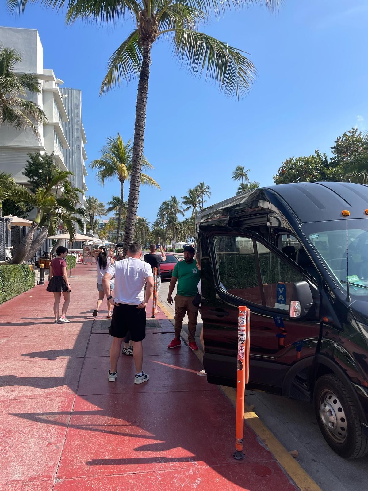 Guests boarding Miami tour bus for the city sightseeing adventure in South Beach
