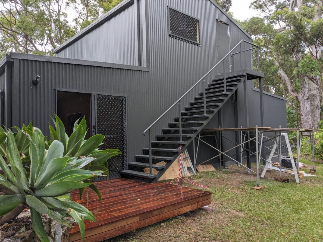 A House With Stairs Leading Up to the Second Floor is Being Built — BK Build Group in Nambucca Heads, NSW