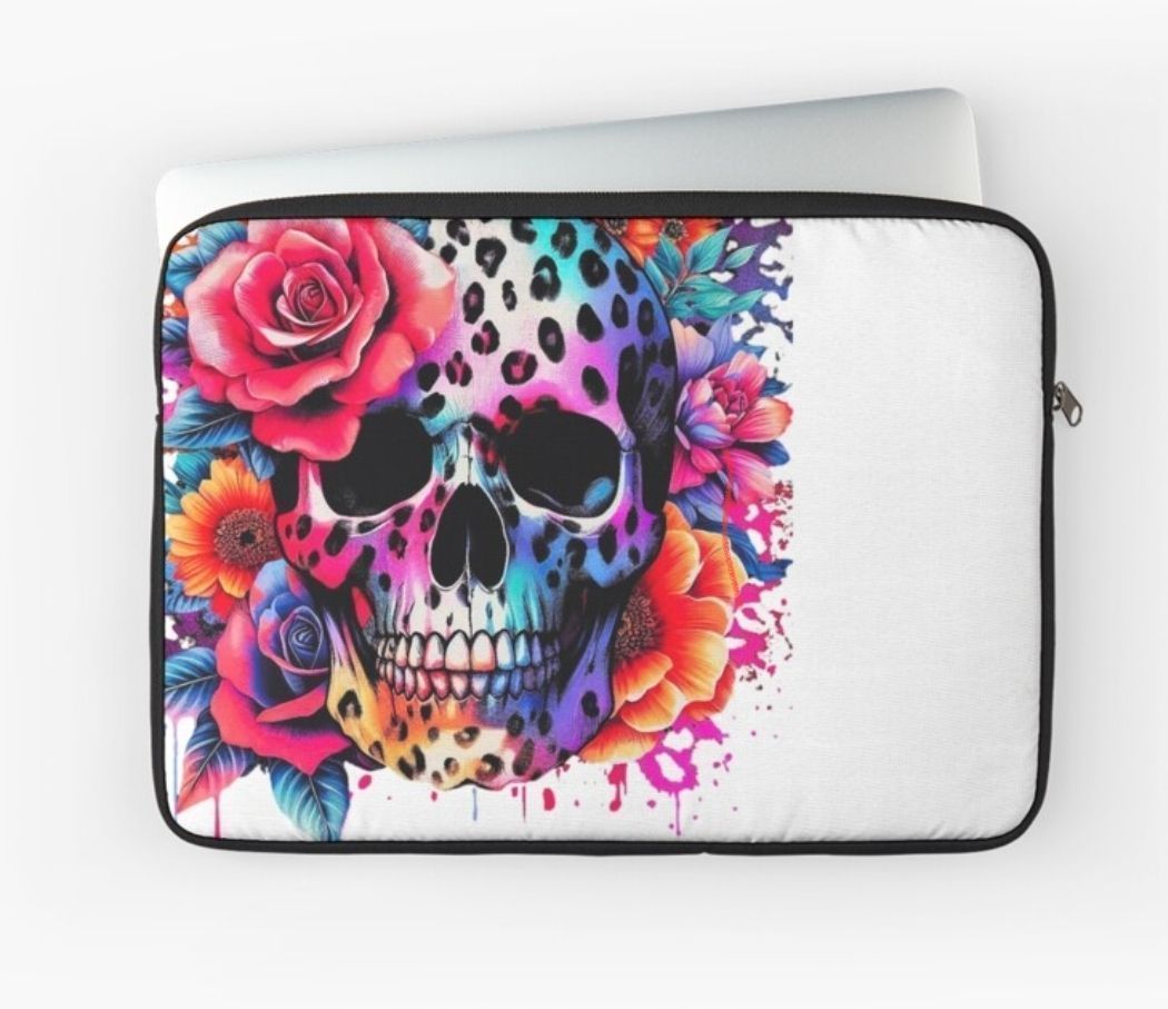 Colorful floral skull on a white laptop sleeve, with pink, blue, and orange accents