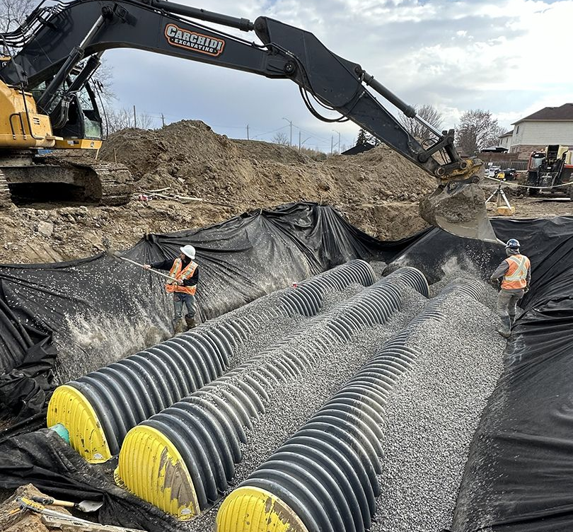 Municipal storm sewer and sanitary servicing installation.