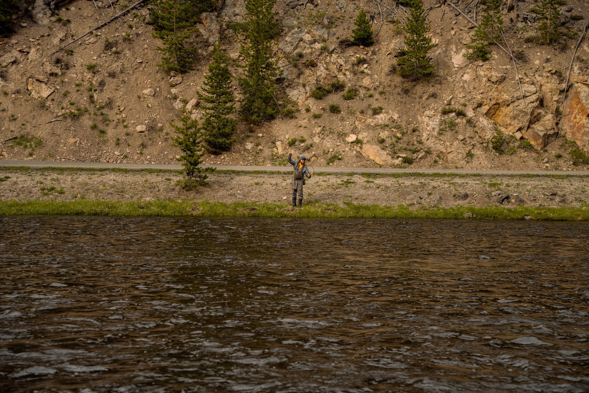 Fisherman in Yellowstone National Park on the Firehole River.