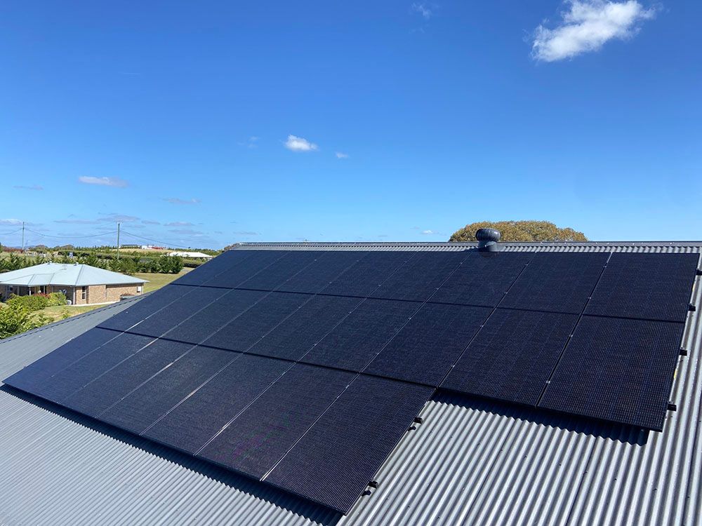 Many Solar Panels On The Roof Of A House — Goulburn Solar In Goulburn, NSW