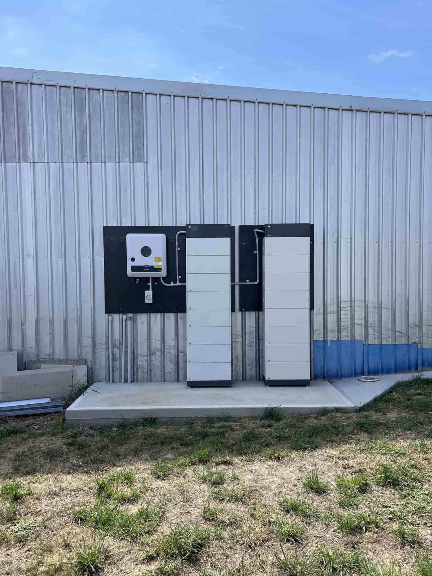 Two Solar Panels On The Side Of A Building — Goulburn Solar In Goulburn, NSW