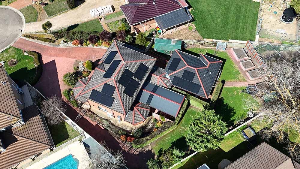An Aerial View Of A House With Solar Panels On The Roof — Goulburn Solar In Goulburn, NSW