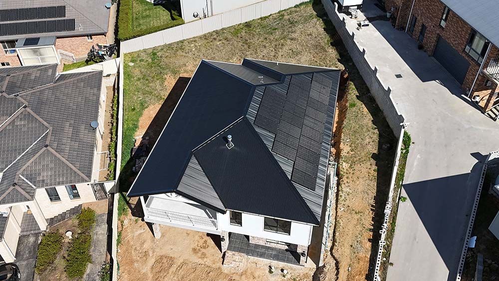 Aerial View Of A House Under Construction In A Residential Area — Goulburn Solar In Crookwell, NSW