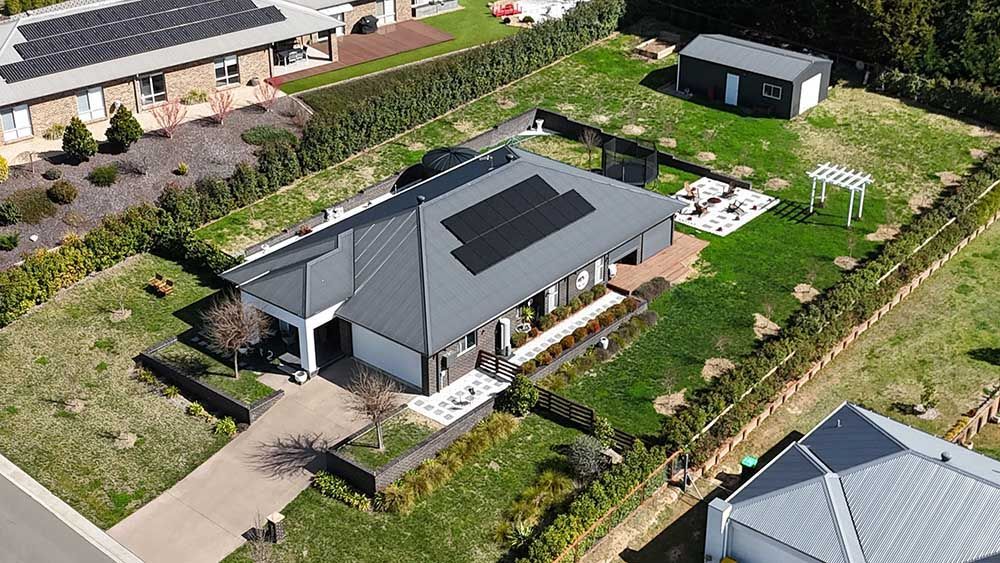 Aerial View Of A House With Solar Panels On The Roof — Goulburn Solar In Moss Vale, NSW