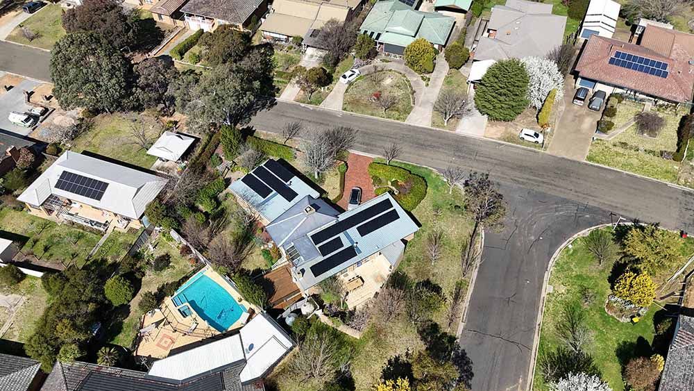 Aerial View Of A Residential Area With A House With Solar Panels On The Roof — Goulburn Solar In Picton, NSW
