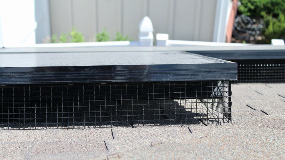 Solar Panel On Roof With A Mesh On It For Bird Proofing — Goulburn Solar In Goulburn, NSW