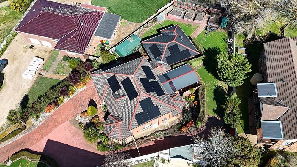 An Aerial View Of Solar Panel System On The Roof — Goulburn Solar In Goulburn, NSW