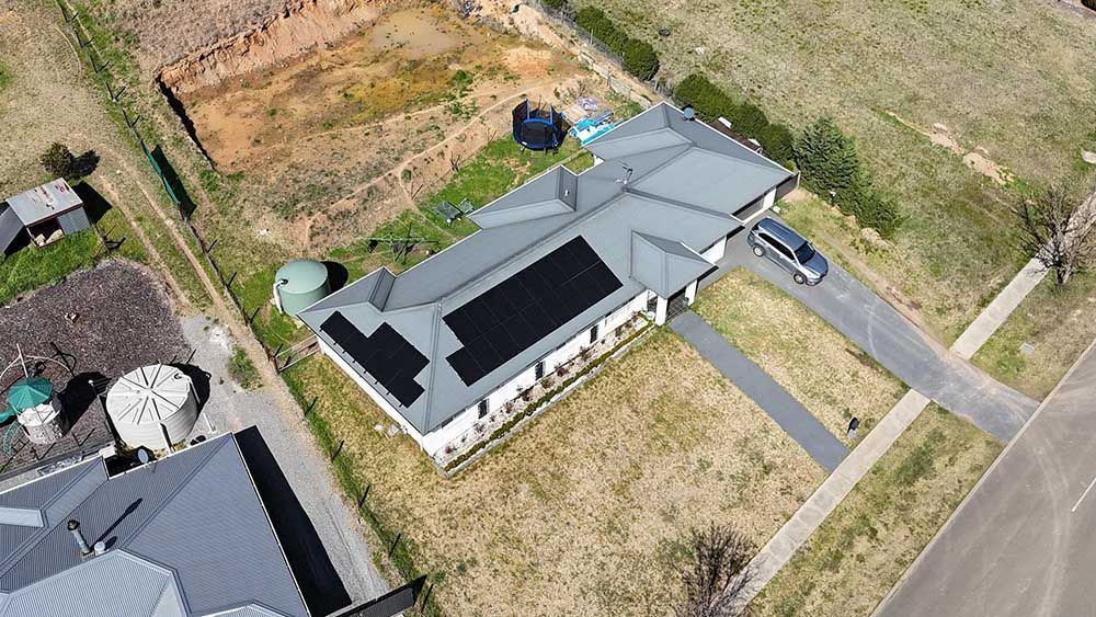 Aerial View Of A House With Solar Panels On The Roof — Goulburn Solar In Taralga, NSW