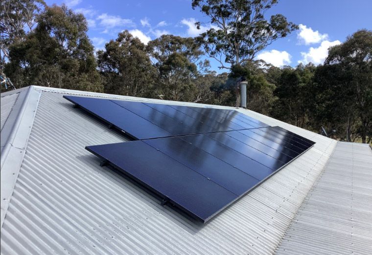 Roof With A Lot Of Solar Panels On It — Goulburn Solar In Goulburn, NSW