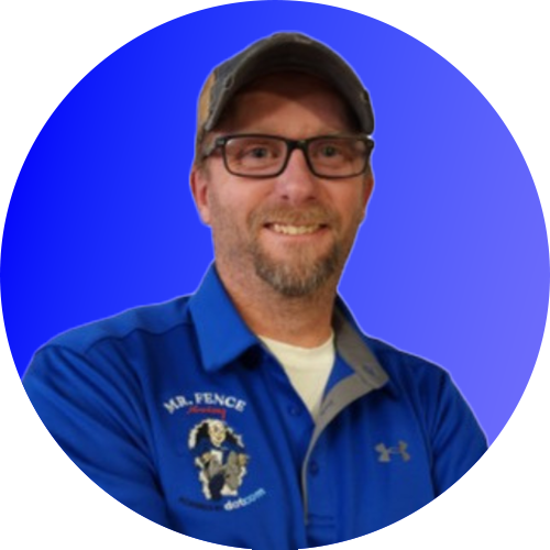 Smiling man in blue jacket and cap against a blue background