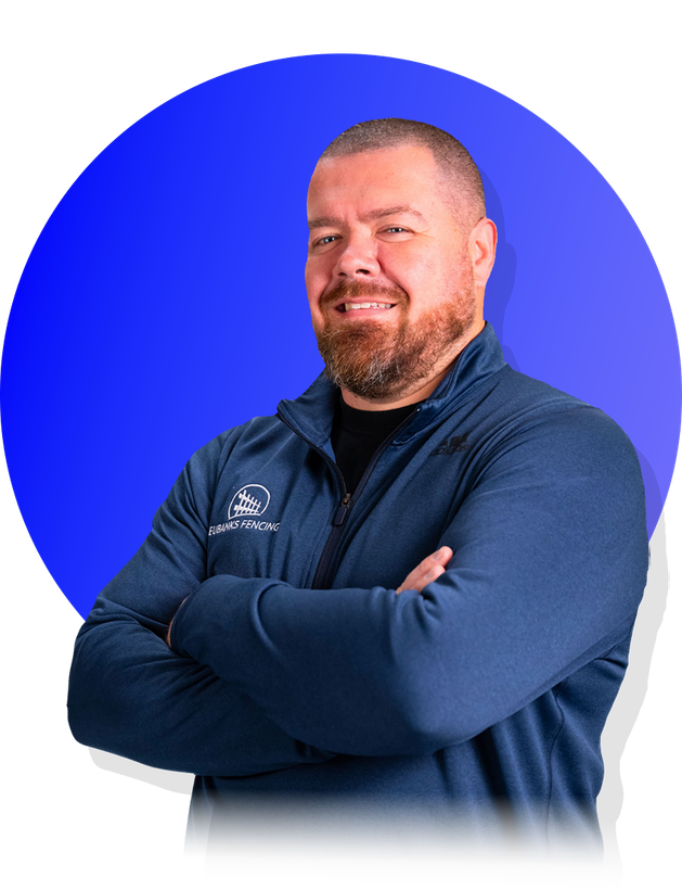 Smiling man with crossed arms in a blue jacket against a blue circular background